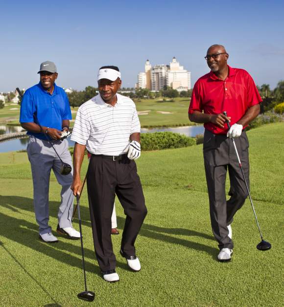 3 Men golfing at Hole in one's Course